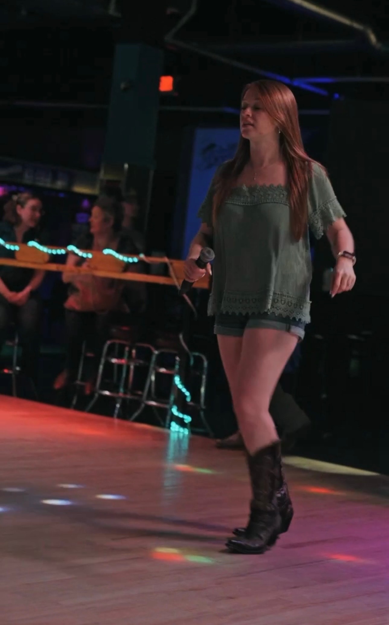 Cowboy boots on a wooden dance floor