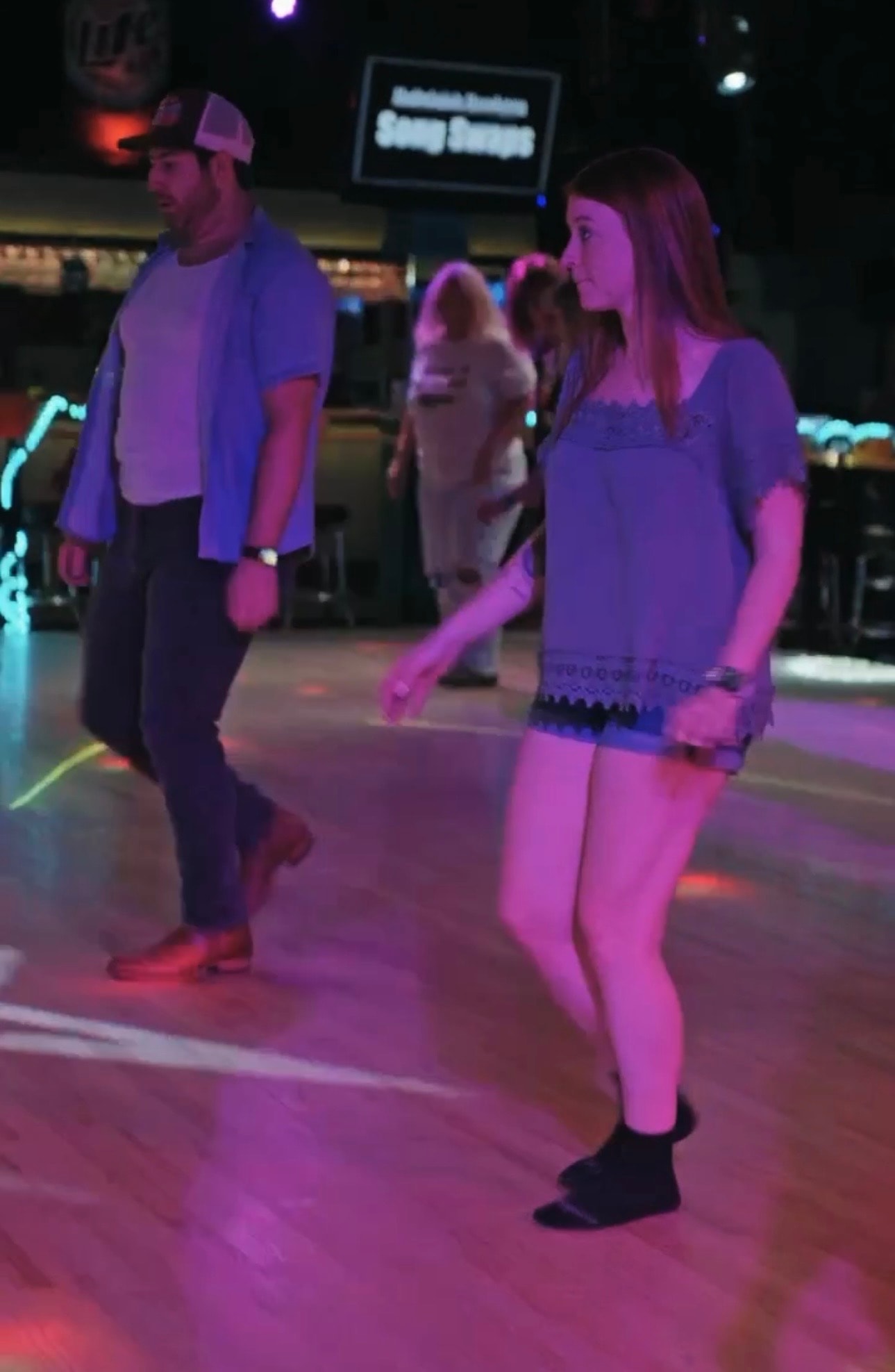 Women dancing together joyfully